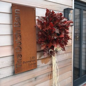 rusty home signage